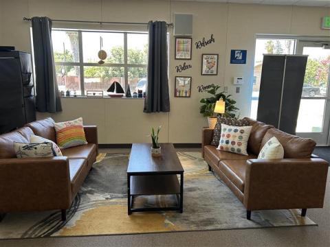 Sitting area with two facing couches and coffee table